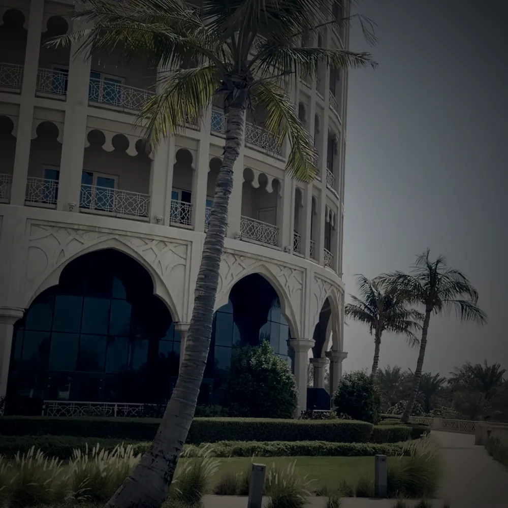 Cover Haunted: the round tower of Al Hamra Residence at dusk, footage by Kay