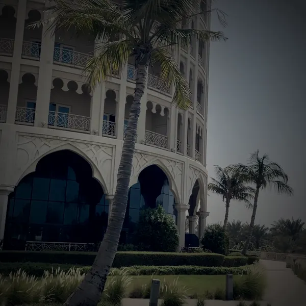 Cover Haunted: the round tower of Al Hamra Residence at dusk, footage by Kay