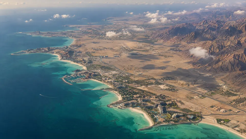 The coast of Ras Al Khaimah from high altitude. AI-generated image.